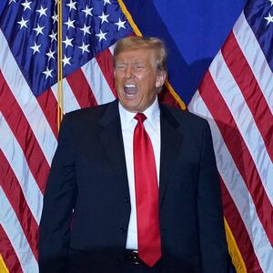 Republican presidential candidate former US President Donald Trump arrives for a campaign event at the Atkinson Resort and Country Club in Atkinson, New Hampshire.