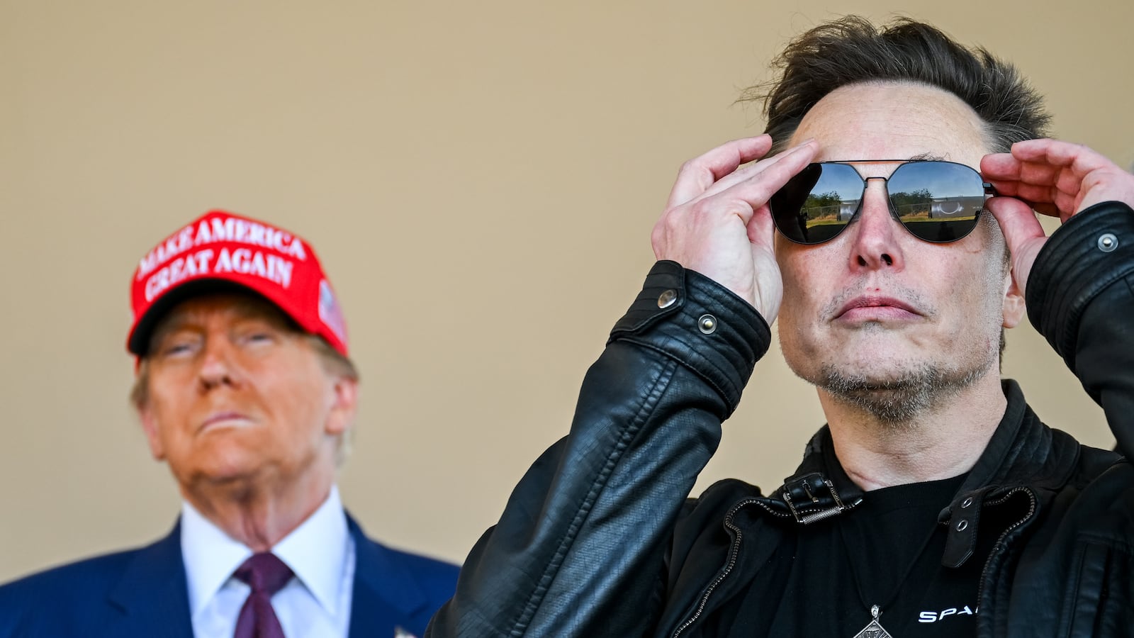 BROWNSVILLE, TEXAS - NOVEMBER 19: U.S. President-elect Donald Trump and Elon Musk watch the launch of the sixth test flight of the SpaceX Starship rocket on November 19, 2024 in Brownsville, Texas. SpaceX’s billionaire owner, Elon Musk, a Trump confidante, has been tapped to lead the new Department of Government Efficiency alongside former presidential candidate Vivek Ramaswamy. (Photo by Brandon Bell/Getty Images)