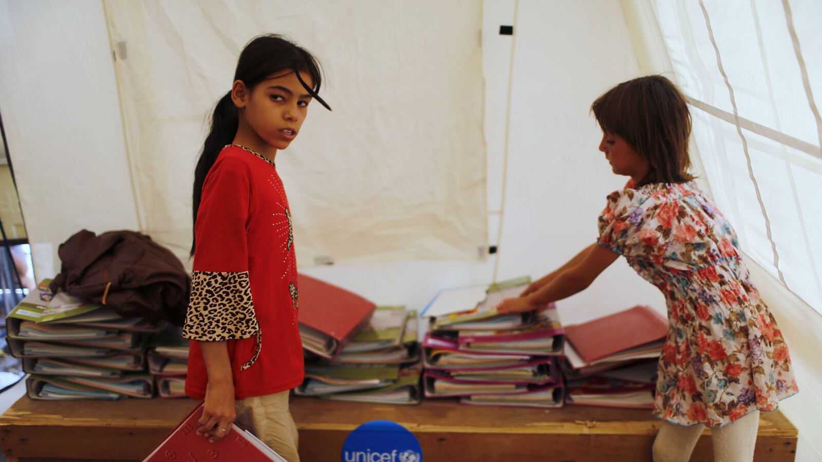 cheats/2014/09/15/isis-bans-teaching-evolution/140915-iraq-children-cheat_qy7a5b