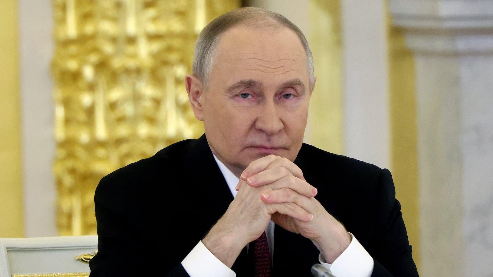 Russian President Vladimir Putin attends an annual meeting