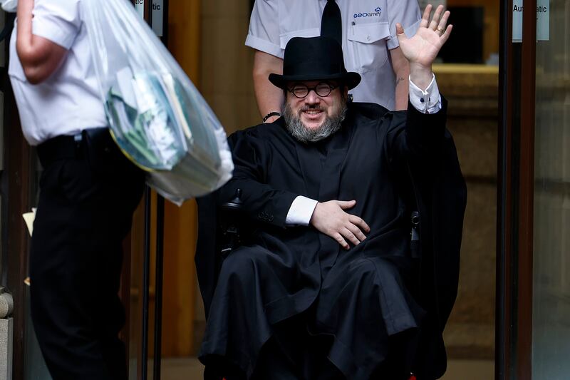 Nicholas Rossi departs Edinburgh Sheriff Court after his extradition hearing on July 12, 2023
