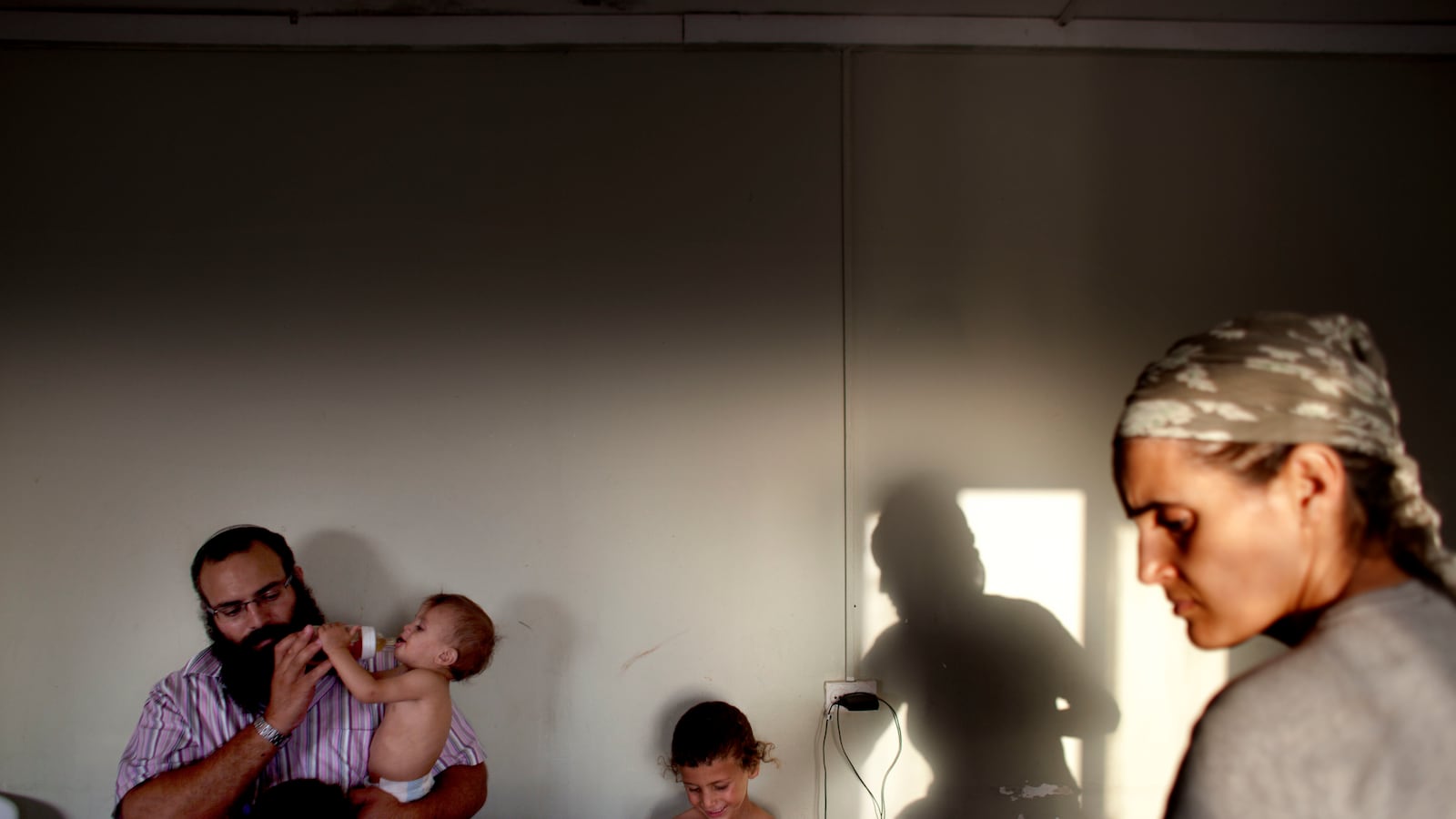 articles/2013/07/23/is-bringing-israeli-labor-law-to-the-west-bank-a-feminist-move/jewish-settler-woman-openz_lcbsxy