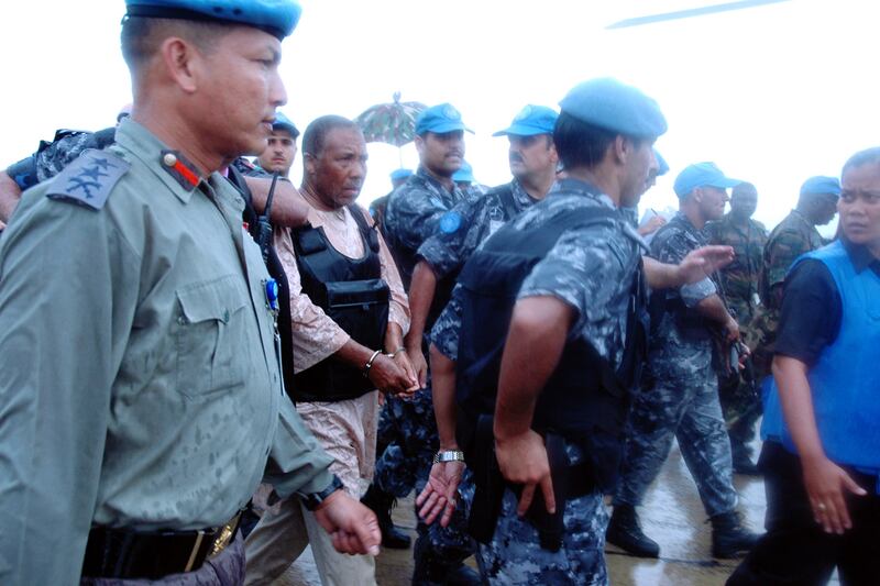 galleries/2012/04/26/charles-taylor-verdict-liberian-warlord-s-alleged-atrocities-photos/liberia-charles-taylor-extradition_jov6yx