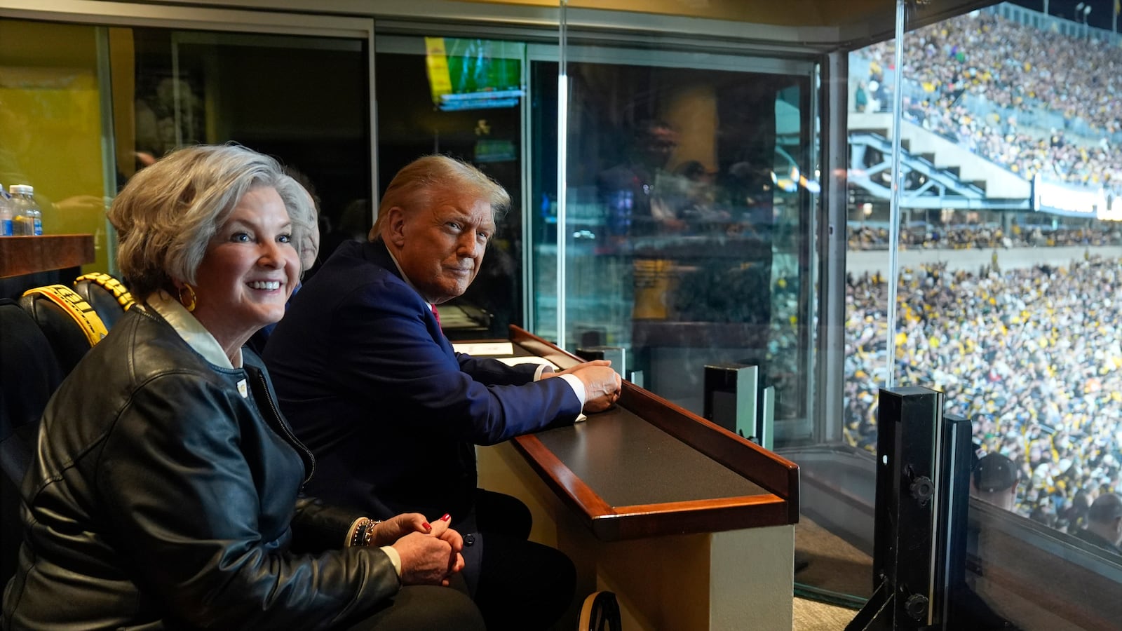 Republican presidential nominee, former President Donald Trump attends a game between the NFL Pittsburgh Steelers and the New York Jets with senior campaign consultant Susie Wiles on October 20, 2024 in Latrobe, Pennsylvania.