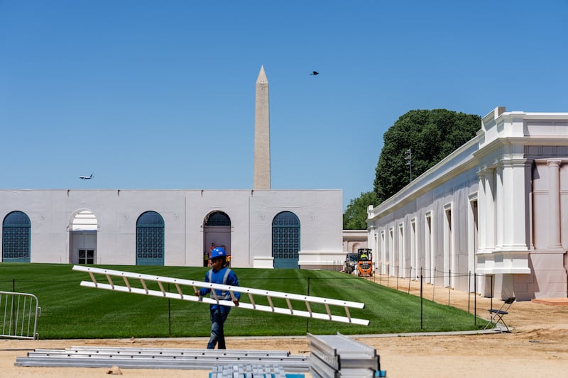 Workers prepare for the Great American State Fair, ahead of the 250th anniversary of U.S. Independence, on the National Mall in Washington, D.C., U.S., June 16, 2026.