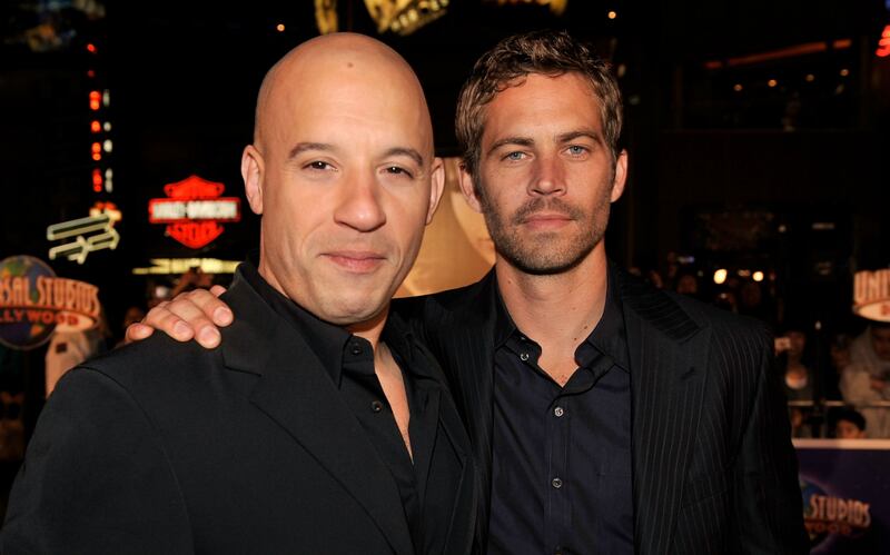 articles/2013/12/03/vin-diesel-pays-tribute-to-paul-walker-the-kardashians-christmas-card-cost-250k/vin-diesel-and-paul-walker-tease_fbqrar