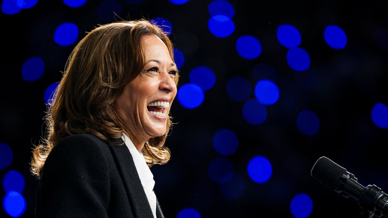 Democratic presidential nominee U.S. Vice President Kamala Harris reacts at a campaign rally at East Carolina University, in Greenville, North Carolina, U.S., October 13, 2024.