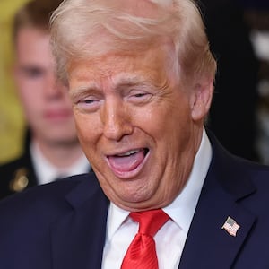 Donald Trump to a large ring during a presentation ceremony for the Commander-in-Chief Trophy.