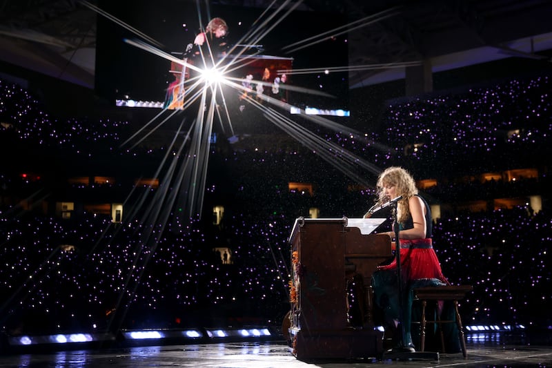 MIAMI GARDENS, FLORIDA - OCTOBER 18: (EDITORIAL USE ONLY. NO STANDALONE PUBLICATION USE (NO SPECIAL INTEREST OR SINGLE ARTIST PUBLICATION USE; NO BOOK USE)) Taylor Swift performs onstage during The Eras Tour at Hard Rock Stadium on October 18, 2024 in Miami Gardens, Florida. (Photo by John Shearer/TAS24/Getty Images for TAS Rights Management)