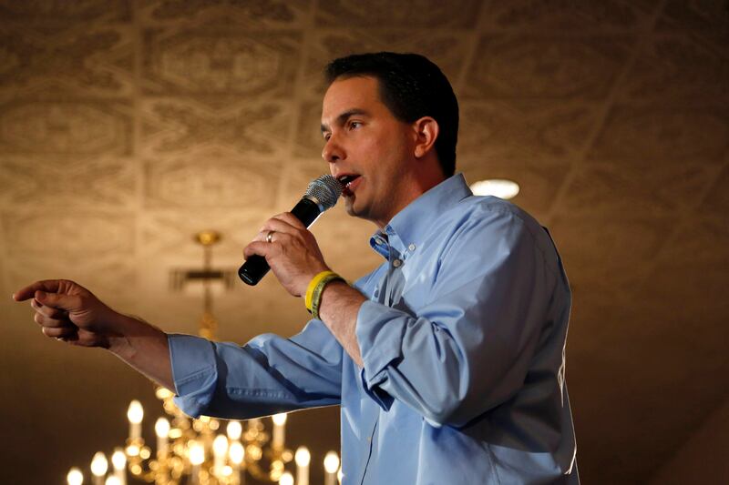 articles/2013/10/23/scott-walker-investigated-in-secret-wisconsin-probe/131022-jacobs-walker-tease_fnyknp