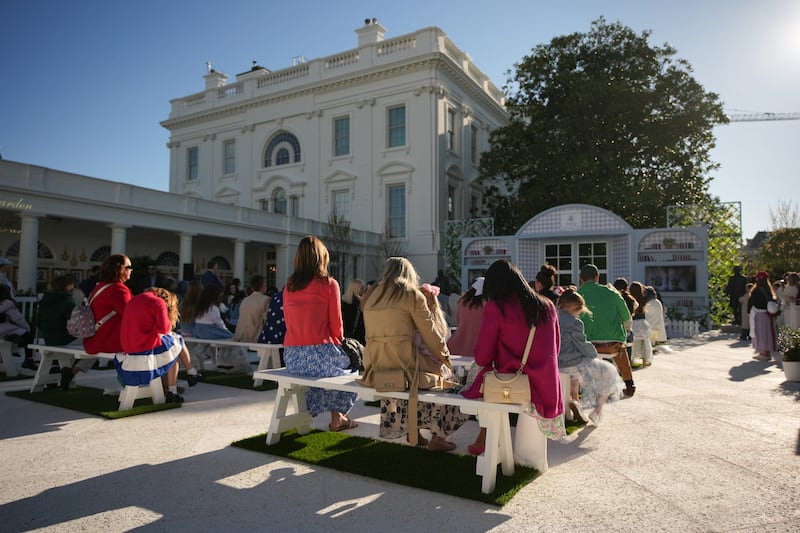 The paved Rose Garden with fake grass strips.