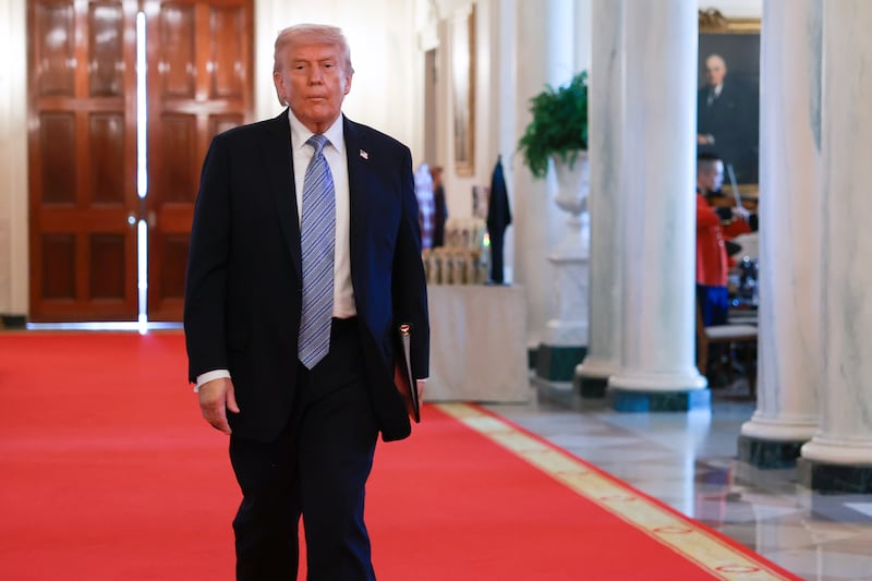 President Donald Trump arrives for a small business summit in the East Room of the White House on May 04, 2026 in Washington, DC where he gave a rambling speech where he suggested he could stay in office for another eight years, called the Iran conflict a "mini war," touted painting the reflecting pool and bragged about being able to identify a squirrel in a cognitive test.