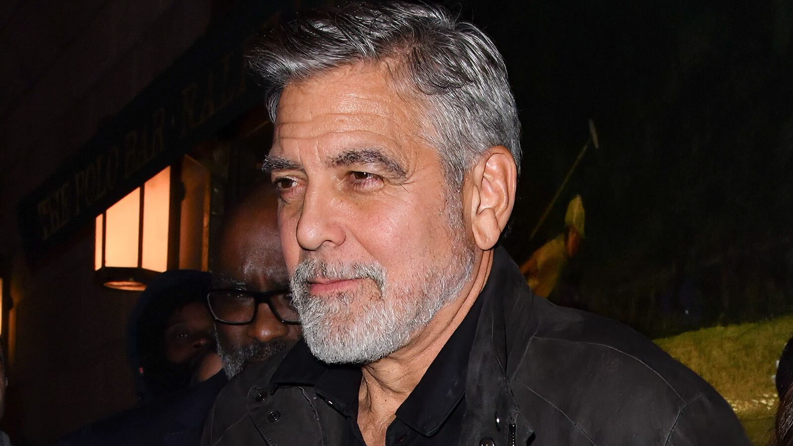 George Clooney leaves the Polo Bar on December 13, 2023 in New York City.