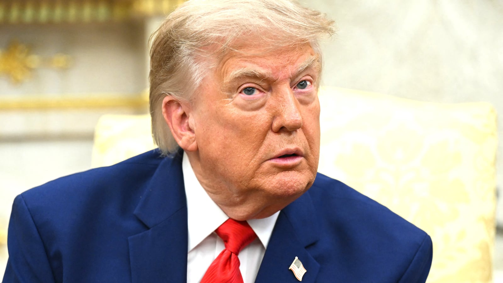 US President Donald Trump listens to questions from the press as he meets with Lebanese President Joseph Aoun in the Oval Office of the White House in Washington, DC, on July 21, 2026.