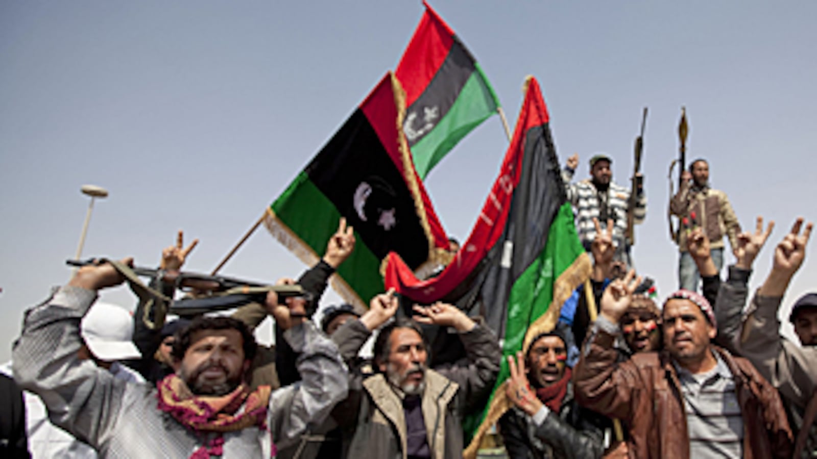 cheats/2011/03/28/rebels-fail-to-take-gaddafirsquos-town/libya-rebels-celebrate_h03eob