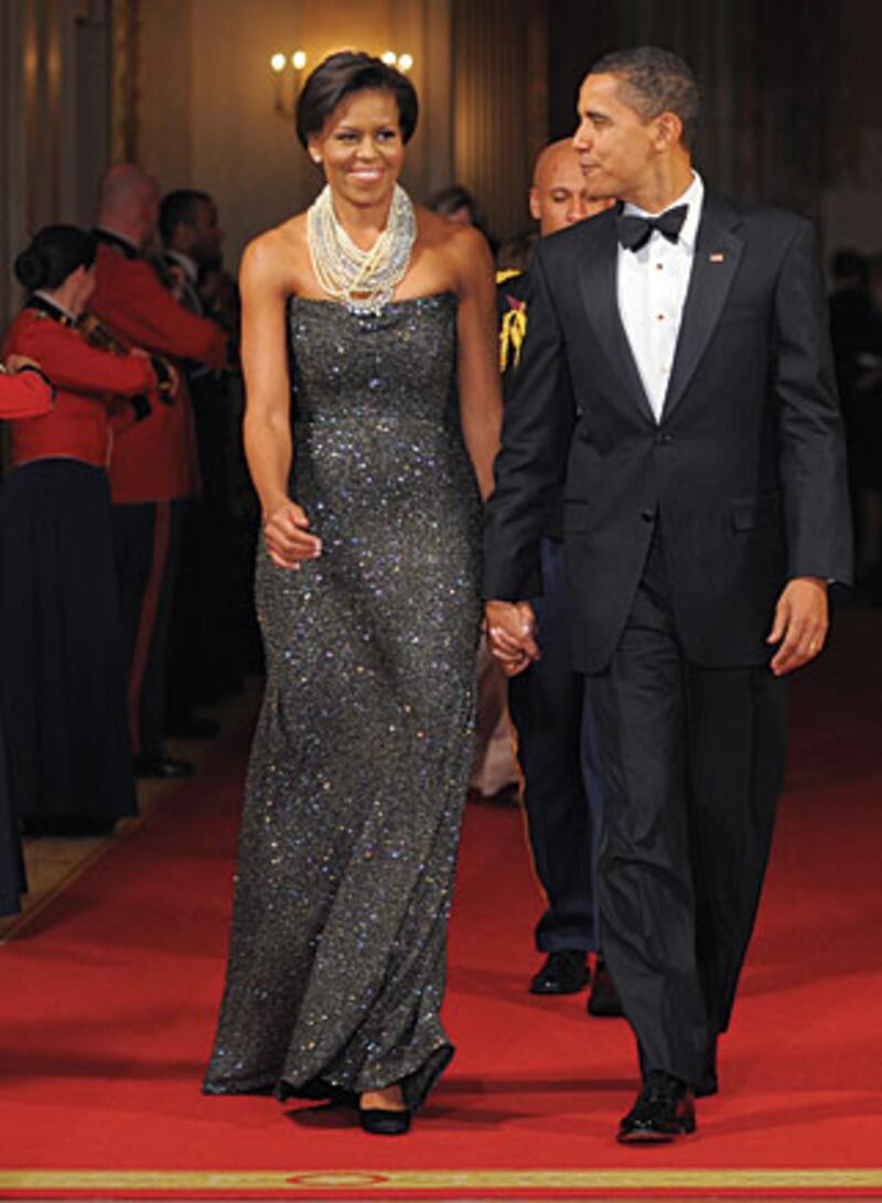 galleries/2009/11/25/a-pictorial-ode-to-michelle-obama/crouch-michelle-obama-6_yvo1dg