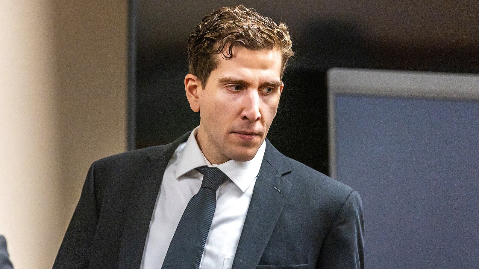 Bryan Kohbeger, the man accused of killing four University of Idaho students, walks into a court hearing in June.