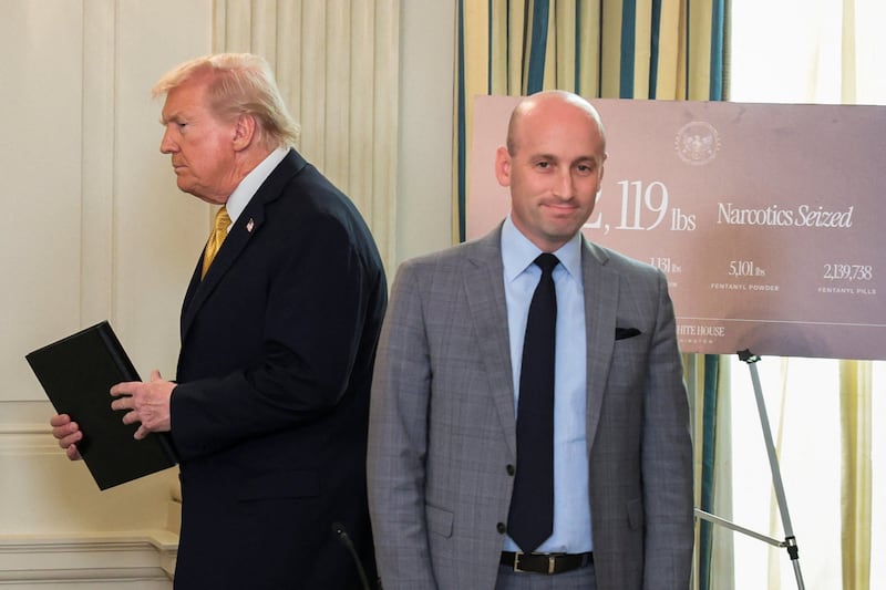 President Donald Trump walks next to White House deputy chief of staff Stephen Miller, on the day of Trump's announcement regarding his administration's policies against cartels and human trafficking, from the State Dining Room at the White House in Washington, D.C., U.S., October 23, 2025.