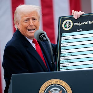 President Donald Trump holding up his tariff chart on what he called “Liberation Day” on April 2 as he has moved to impose sweeping tariffs on countries around the world since taking office.