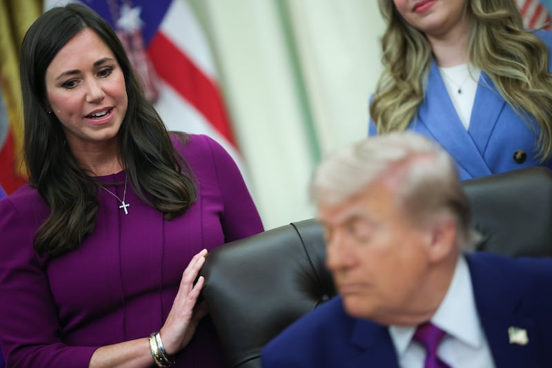 WASHINGTON, DC - MAY 11:  U.S. President Donald Trump listens as Sen. Katie Britt (R-AL) (L) delivers remarks during an event on maternal healthcare in the Oval Office of the White House on May 11, 2026 in Washington, DC. The Trump administration recently launched Moms.gov, a website to help provide resources to expecting women and their families. (Photo by Kevin Dietsch/Getty Images)