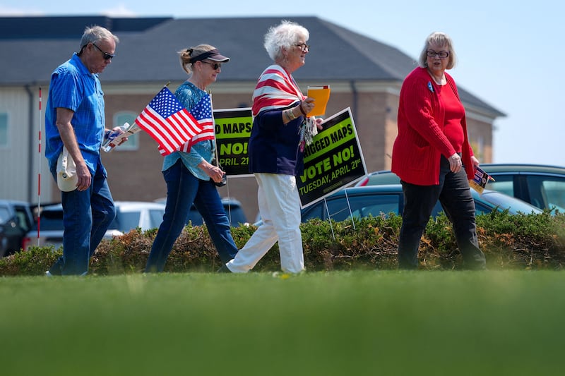 FILE PHOTO: Supporters depart a campaign rally against Virginia Democrats' proposed state redistricting constitutional amendment ahead of the referendum special election on April 21, in Bridgewater, Virginia, April 11, 2026. REUTERS/Ken Cedeno/File Photo