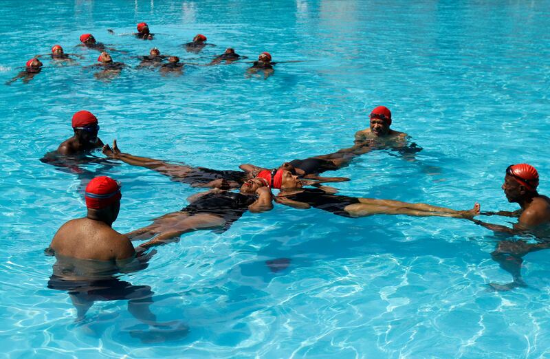 galleries/2013/05/25/vintage-summer-in-new-york-the-sweet-sweaty-city-life/130524-nyc-swim-synchronized_p6rqse