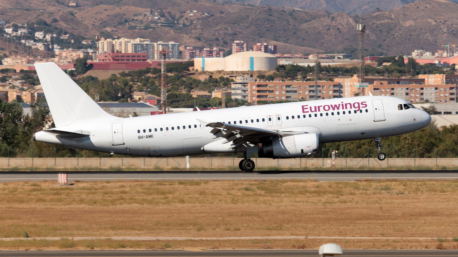 MALAGA, SPAIN - 2022/08/21: An Avion Express Malta Airbus 320 flying on behalf of Eurowings landing at Malaga Costa del Sol airport. Avion Express Malta is the Avion Express subsidiary based at Malta International Airport. The carrier was granted a Maltese air operator's certificate and commenced operations on 20-May-2019 with A320 aircraft. Avion Express Malta operates ACMI services to scheduled and charter carriers. (Photo by Fabrizio Gandolfo/SOPA Images/LightRocket via Getty Images)