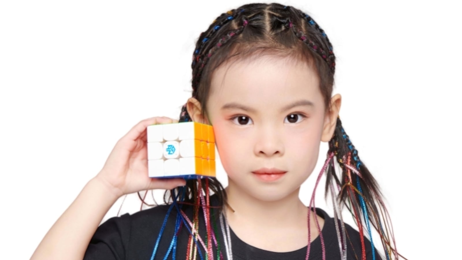Lian Yunzhi, 6, has broken the women’s world record for solving a Rubik’s Cube.