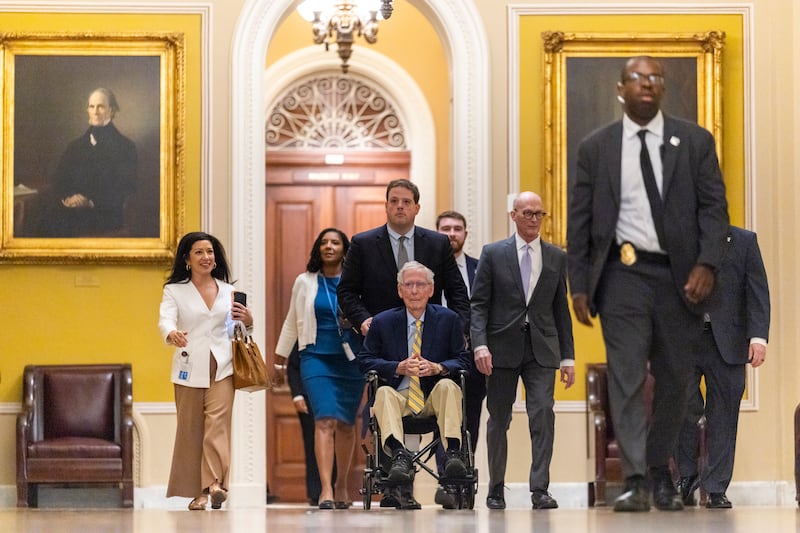 Sen. Mitch McConnell arrives for a vote at the U.S. Capitol on September 14, 2026 in Washington, D.C accompanied by his chief of staff Terry Carmack and communications director Stephanie Penn. It was McConnell’s first public appearance in over 90 days after he recovered from a fall and illness.