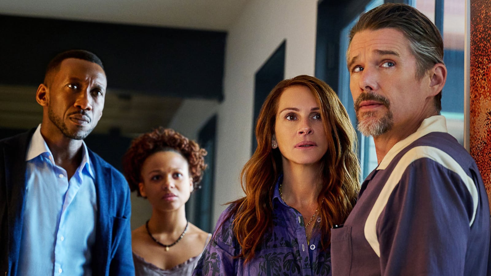 Mahershela Ali as G.H., Myha’la Herrold as Ruth, Julia Roberts as Amanda and Ethan Hawke as Clay in the film Leave the World Behind on Netflix