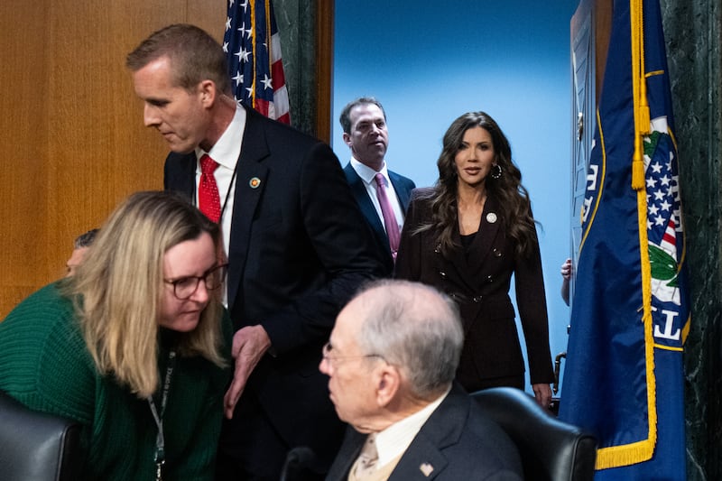 Secretary of Homeland Security Kristi Noem with her husband Bryon Noem arrive at the hearing on March 3, 2026.
