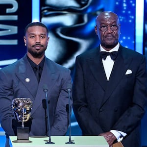 Michael B. Jordan and Delroy Lindo present the Special Visual Effects Award on stage during the EE BAFTA Film Awards 2026 at The Royal Festival Hall on February 22, 2026 in London, England.