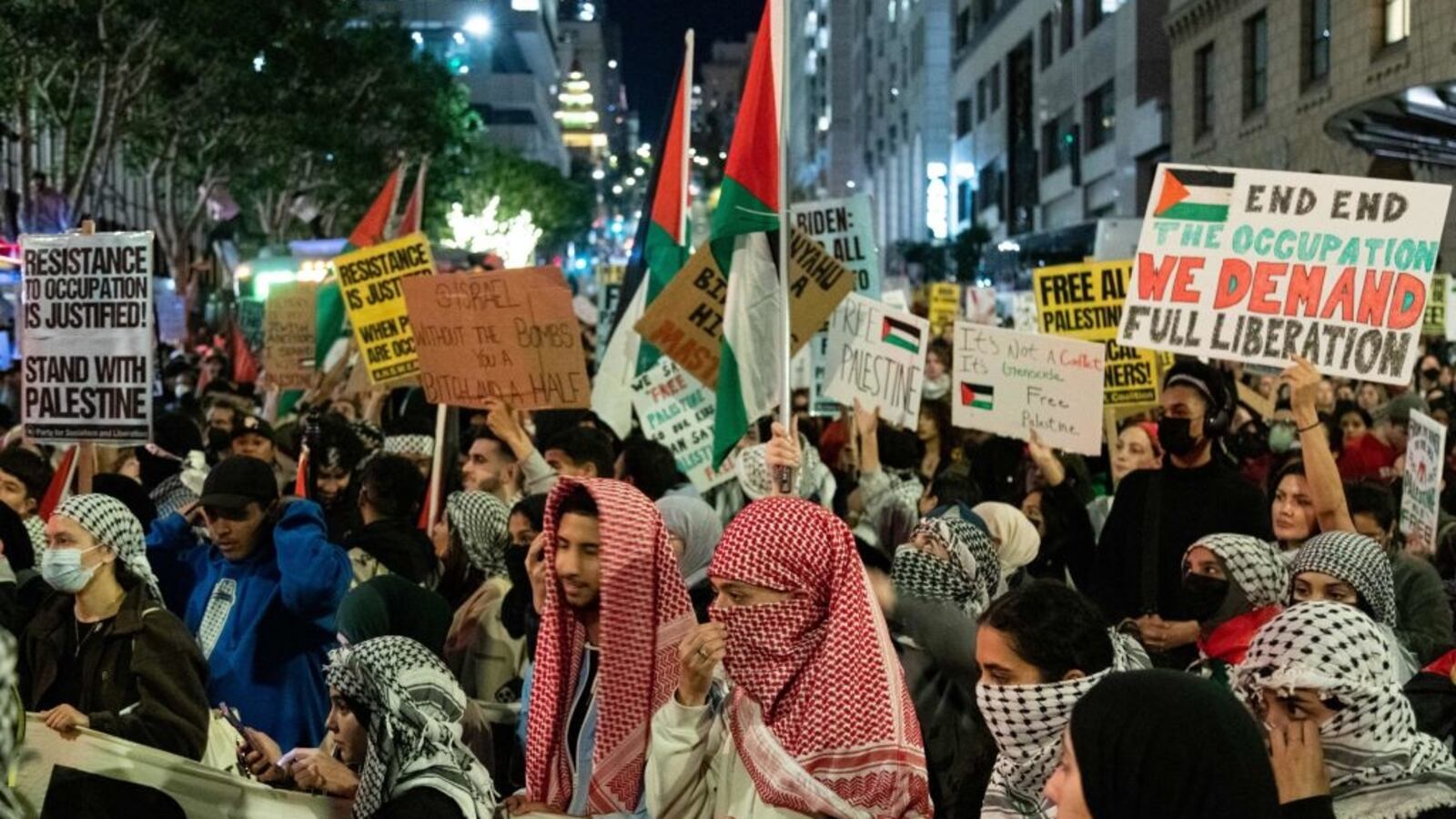 Protesters marching in support of Palestinians fill an intersection near where the US President was holding a fundraiser while in town for the Asia-Pacific Economic Cooperation (APEC) summit in San Francisco.