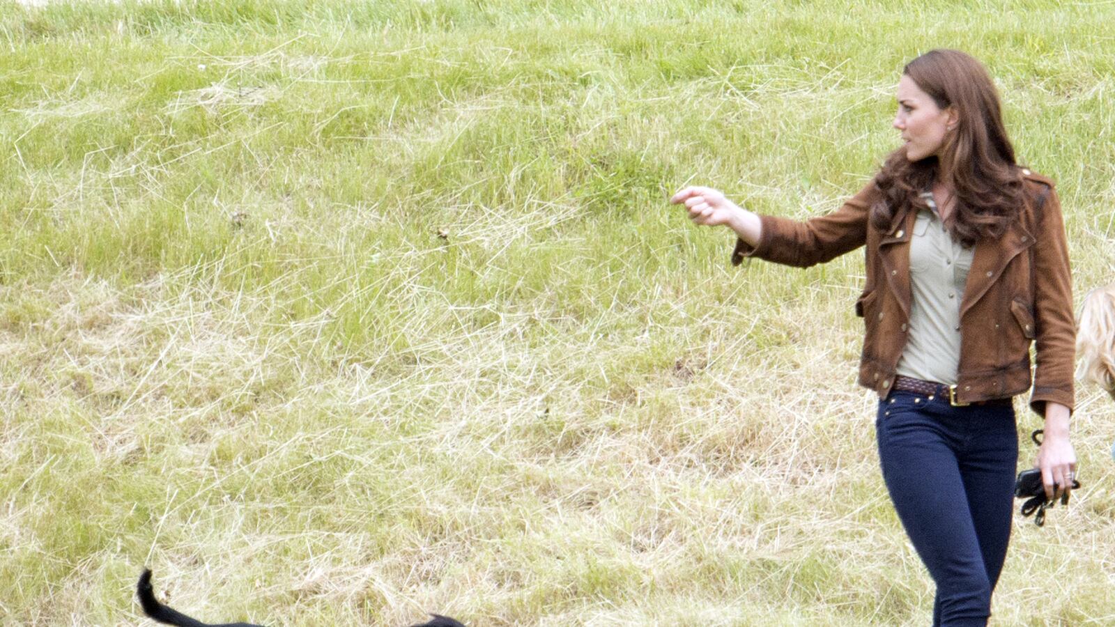 articles/2013/07/19/drama-as-kate-s-other-baby-gets-its-head-stuck-in-gates/dog-lupo-2012-kate-middleton-through-the-years_v7pitq