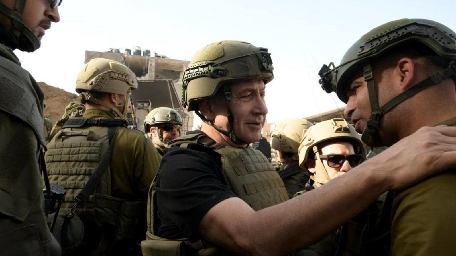 Israeli Prime Minister Benjamin Netanyahu visits military troops in the northern Gaza Strip.