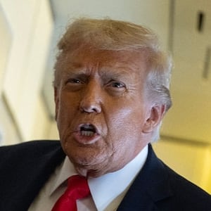 US President Donald Trump speaks to the press as he flies back to the United States from the United Kingdom onboard Air Force One on September 18, 2025. (Photo by ANDREW CABALLERO-REYNOLDS / AFP) (Photo by ANDREW CABALLERO-REYNOLDS/AFP via Getty Images)