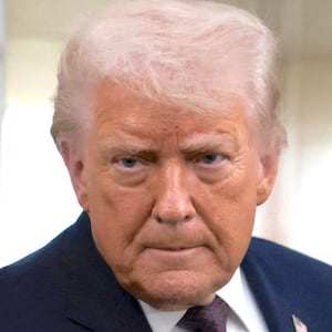 U.S. President Donald Trump speaks to reporters over the North Atlantic as he returns to Washington from the World Economic Forum (WEF) in Davos, Switzerland, aboard Air Force One, U.S., January 22, 2026.