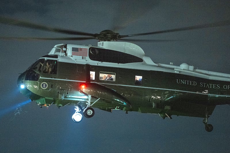 SEPTEMBER 13: U.S. President Donald Trump and Executive Assistant to the President Natalie Harp return to the White House aboard Marine One on September 13, 2025 in Washington, DC. President Trump is returning after spending the weekend in Ireland where he met with leaders and attended the 2026 Amgen Irish Open at his Trump International Golf Links and Hotel.