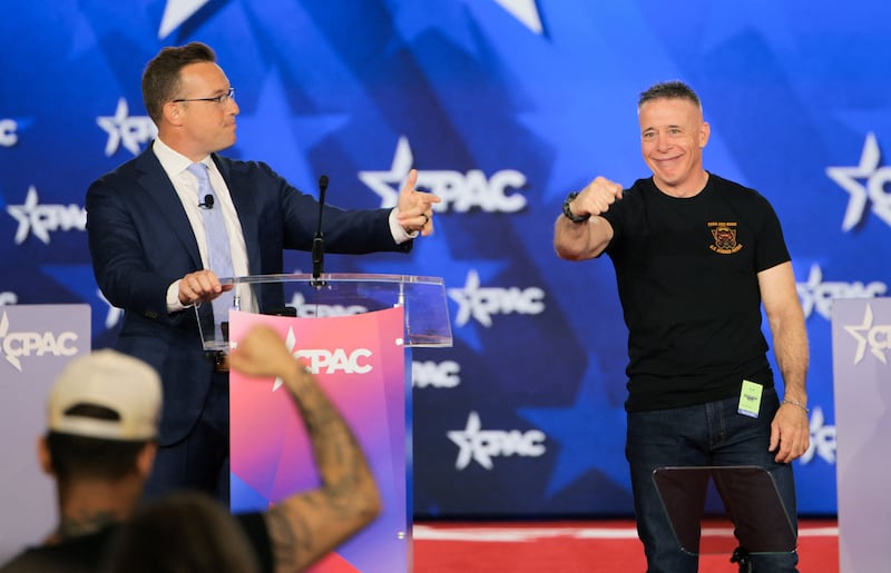 Host of "The Benny Show", Benny Johnson, welcomes former U.S. Border Patrol Chief Gregory Bovino onstage during the 2026 Conservative Political Action Conference (CPAC) in Grapevine, Texas, U.S., March 26, 2026. REUTERS/Daniel Cole