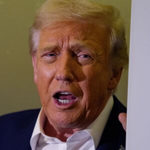 IN FLIGHT - OCTOBER 24: U.S. President Donald Trump speaks to members of the media aboard Air Force One on October 24, 2025, in flight. Trump is traveling to Malaysia for the Association of Southeast Asian Nations summit (ASEAN), Japan, and to South Korea for the Asia-Pacific Economic Cooperation forum (APEC). (Photo by Andrew Harnik/Getty Images)