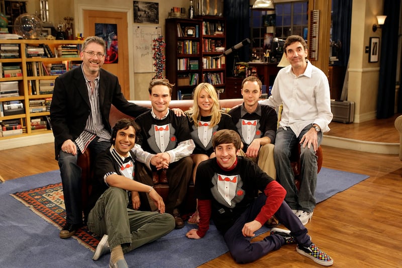 OS ANGELES - MAY 13: "The Tangerine Factor" -- The cast of THE BIG BANG THEORY - Kunal Nayyar (second to the left), Johnny Galecki (third from left), Kaley Cuoco (center), Jim Parsons (second from right) and Simon Helberg (foreground, right) - on set with executive producers Bill Prady (far left) and Chuck Lorre (far right). The first season finale of THE BIG BANG THEORY, Monday, May 19, 2008 on the CBS Television Network. (Photo by Sonja Flemming/CBS via Getty Images)