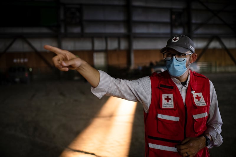 Dale Kunce, CEO of American Red Cross Cascades Region, where evacuees from the Bootleg Fire take shelter, gestures during an interview as extreme heat and wildfires continue in Klamath Falls, Oregon, U.S. July 12, 2021.   REUTERS/Mathieu Lewis-Rolland