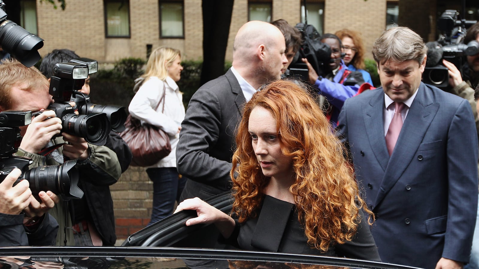 articles/2012/06/22/brooks-rupert-murdoch-s-former-deputy-appears-in-court/giglio-brooks-face-judges-tease_jprwhz