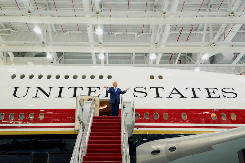U.S. President Donald Trump gestures as he tours the VC-25B aircraft gifted by Qatar that will be used as Air Force One, at Joint Base Andrews, Maryland, U.S., June 19, 2026. REUTERS/Elizabeth Frantz     TPX IMAGES OF THE DAY