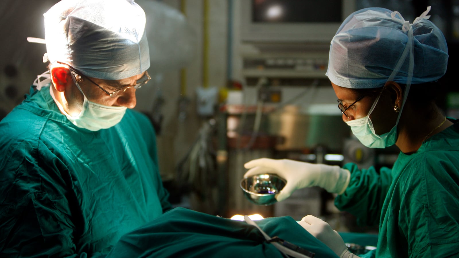 Surgeons perform an operation