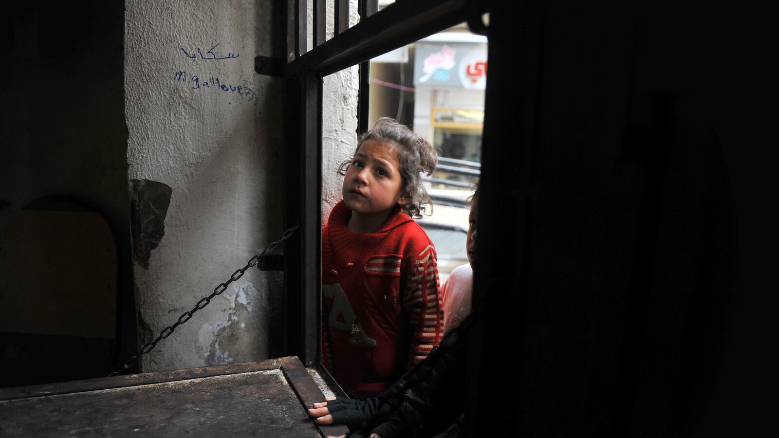 articles/2013/04/01/the-agony-of-syria-s-children/130331-Dettmer-Aleppo-tease_mkos57