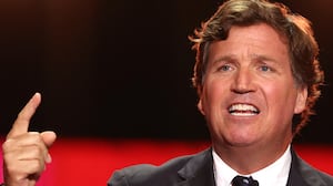 US political commentator Tucker Carlson speaks during the public memorial service for right-wing activist Charlie Kirk at State Farm Stadium in Glendale, Arizona, on September 21, 2025.