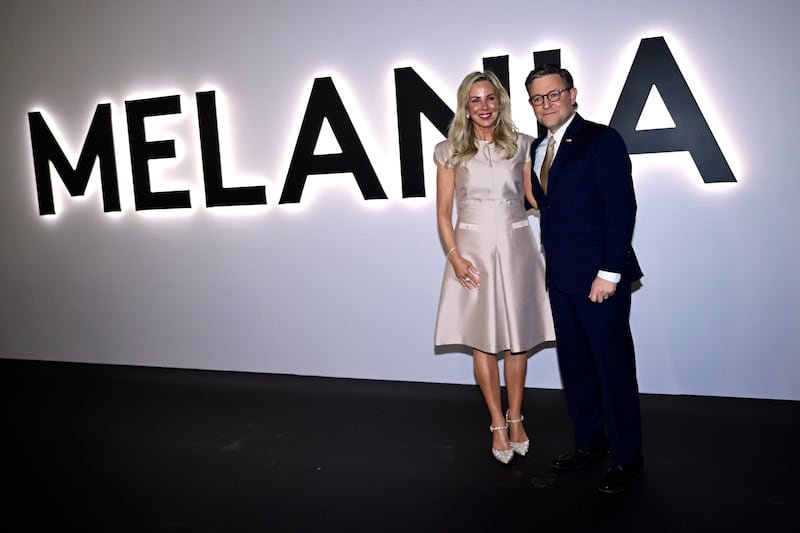 Kelly and Mike Johnson at the Melania premiere.