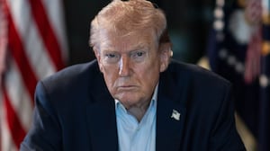 U.S. President Donald J. Trump sits at a table monitoring military operations during Operation Epic Fury against Iran.
