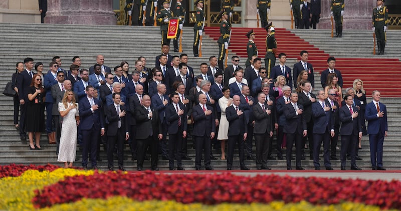 Members of the U.S. delegation and CEOs from various industries stand prior to a welcome ceremony for U.S. President Donald Trump outside the Great Hall of the People on May 14, 2026 in Beijing, China. Xi held talks with Trump at the Great Hall of the People in Beijing on Thursday.
